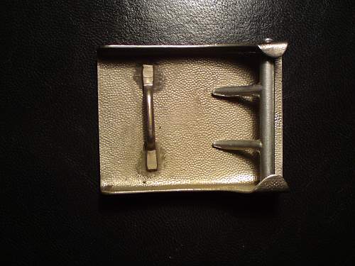 Unknown blank grained steel buckle.