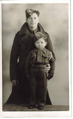 Soldier with boy &amp; boy in uniform