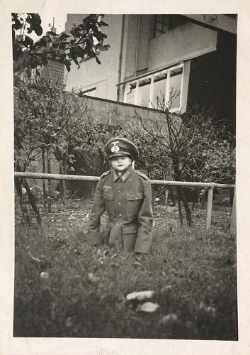 Soldier with boy &amp; boy in uniform