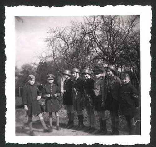 Soldier with boy &amp; boy in uniform