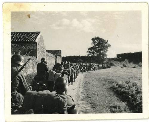 Original photo of Waffen-SS motorized troops traveling down a road