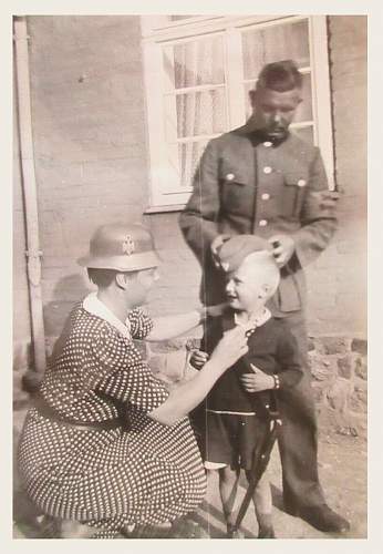 Soldier with boy &amp; boy in uniform