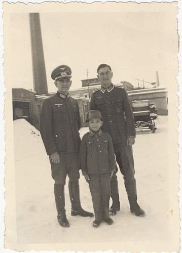 Soldier with boy &amp; boy in uniform