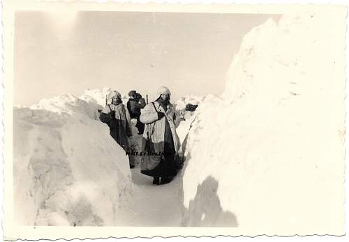 Photo of Heer troops in snow trench