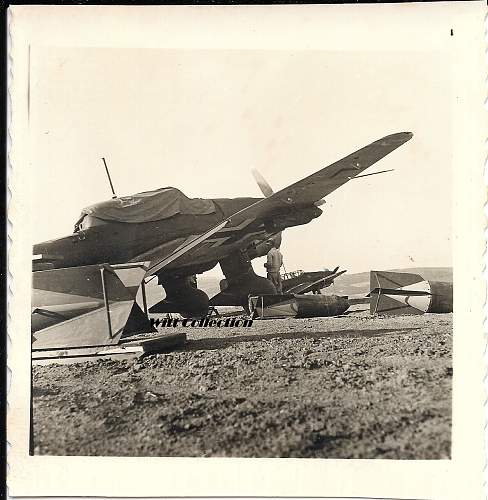 Photo of Stukas being rearmed with bombs