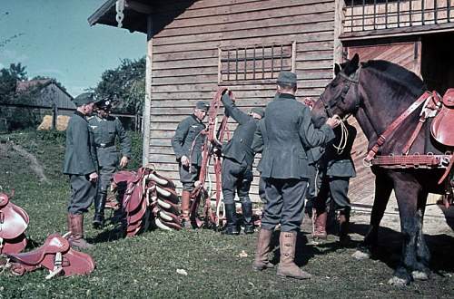 Original WW2 Era Photo showing German soldiers in interesting looking outfits. Look to be in training.