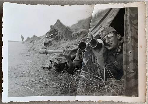 Original WW2 Era Photo showing German Soldiers joking around in tents. Two are holding a Stielhandgranate.