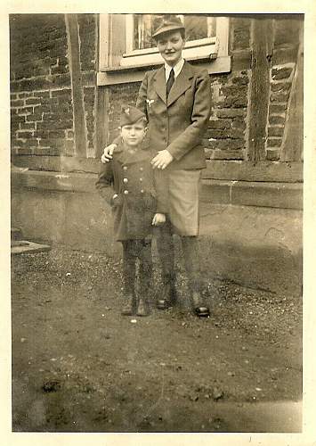 Soldier with boy &amp; boy in uniform