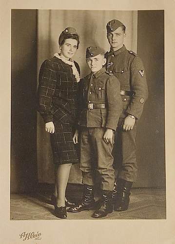 Soldier with boy &amp; boy in uniform