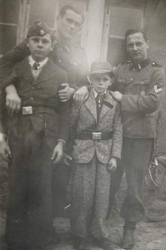 Soldier with boy &amp; boy in uniform