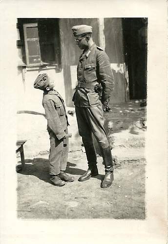 Soldier with boy &amp; boy in uniform