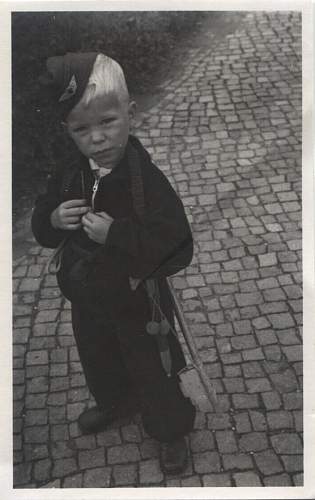 Soldier with boy &amp; boy in uniform