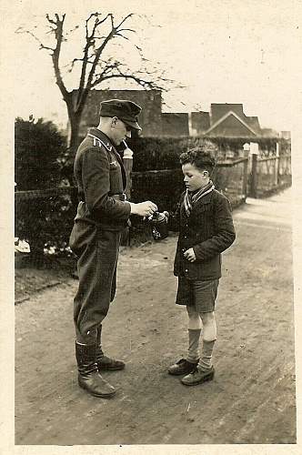 Soldier with boy &amp; boy in uniform