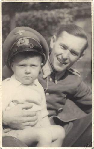 Soldier with boy &amp; boy in uniform