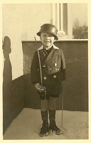 Soldier with boy &amp; boy in uniform