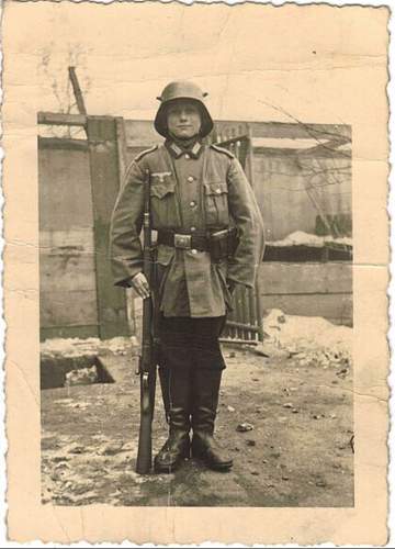 Soldier with boy &amp; boy in uniform