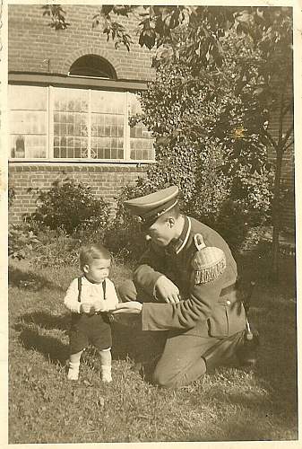 Soldier with boy &amp; boy in uniform