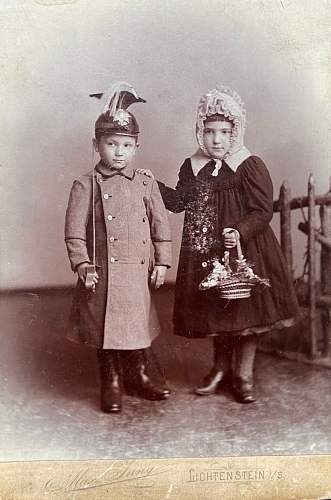 Soldier with boy &amp; boy in uniform