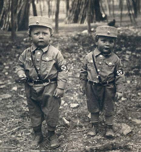 Soldier with boy &amp; boy in uniform