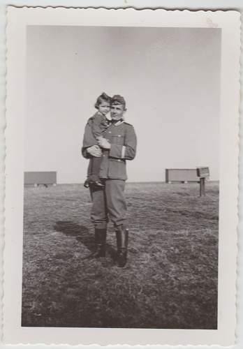 Soldier with boy &amp; boy in uniform