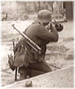 Pictures of WWII soldiers using enemy guns