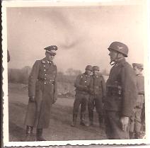 LuftWaffe Officer? inspecting paratrooper