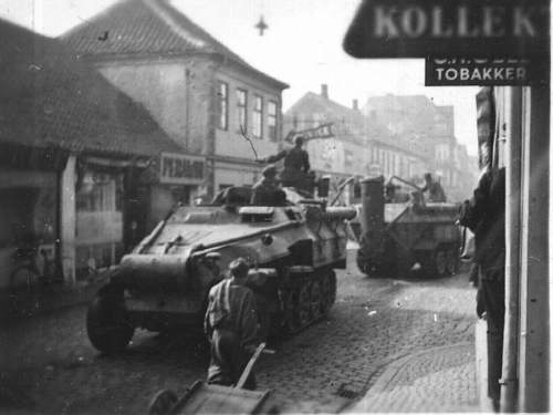 German staff car with weird tanks on front end?