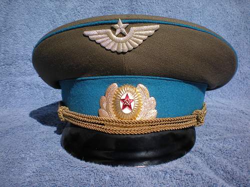 Trying to  identify Russian peaked caps