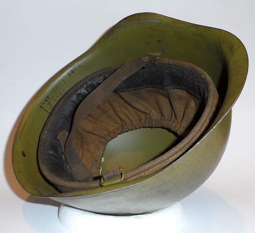 A 1940 dated Ssh 40 helmet with early type chinstraps