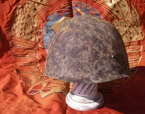 Ground dug Soviet helmets from Stalingrad area