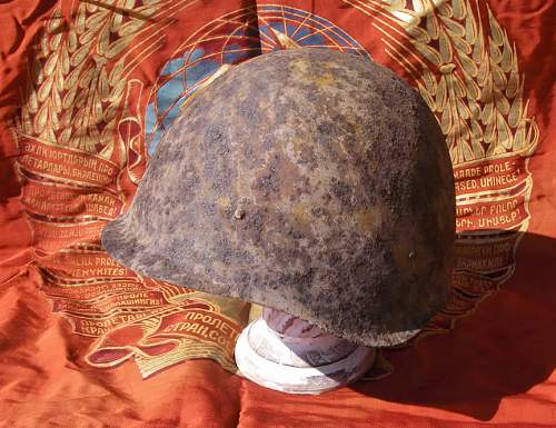 Ground dug Soviet helmets from Stalingrad area