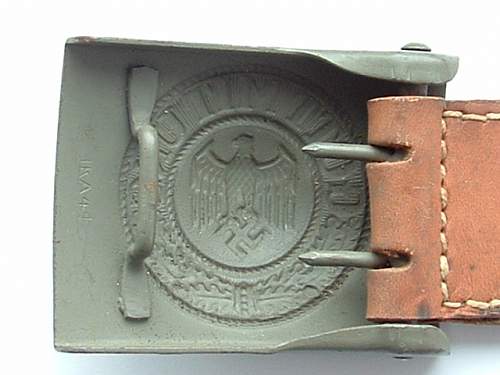 Eagles heads on Wehrmacht buckles
