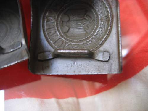 N&amp;H 1942 Buckles - comparing