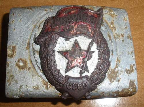 A tale of two soldiers: Heer buckle with Soviet Guards badge afixed.