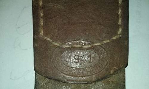 Help with reading a leather tab on a Heer Buckle?