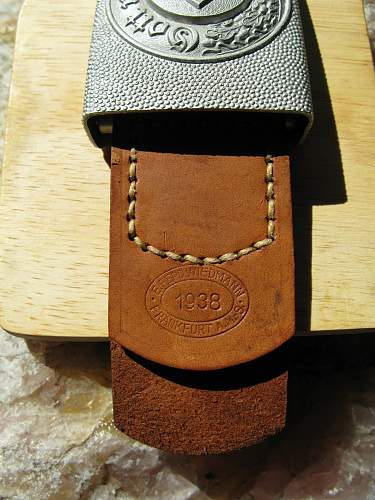 Help with reading a leather tab on a Heer Buckle?