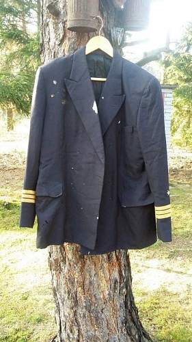 Kriegsmarine jacket not in the best shape.