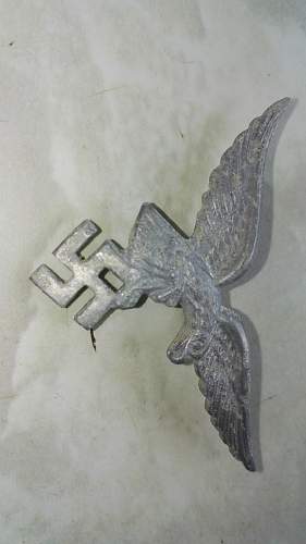 Luftwaffe and Wehrmacht and NSKOV cap badges