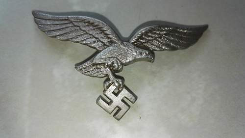 Luftwaffe and Wehrmacht and NSKOV cap badges