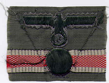 Army woven cap badge.