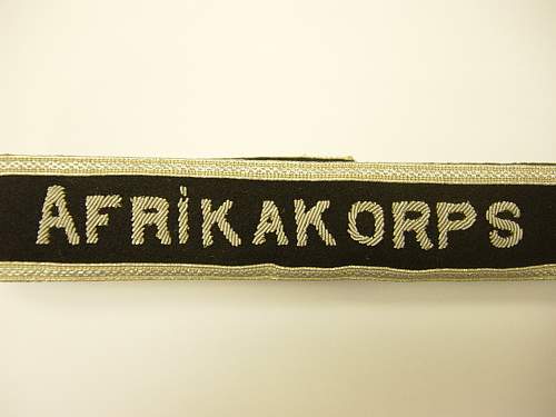 Early Black DAK cufftitle from a DAK Vet