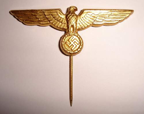 Three insignias: Heer shoulderboard, Heer chest eagle EM/NCO and KM Officers'  cap eagle - Original?