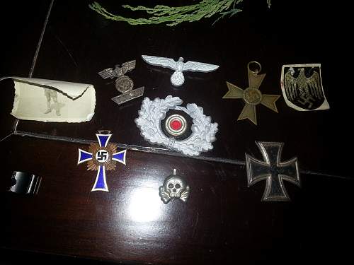 Old box of Nazi insignia and medals from my Grandfather.