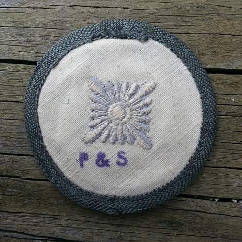 Identify maker stamp on twill Oberschutze rank pip