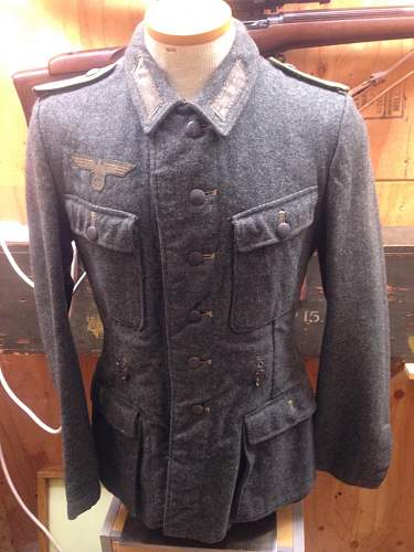 M42 Enlisted Man Tunic. Restored shoulder boards, most likely restored eagle. Junior collector seeking confirmation.