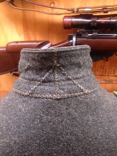 M42 Enlisted Man Tunic. Restored shoulder boards, most likely restored eagle. Junior collector seeking confirmation.