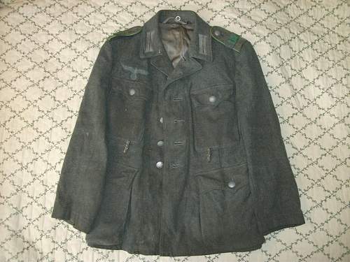 Heer M42 tunic. F 43 Depot marked. Combat worn.