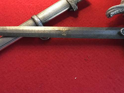 Army dagger with damascus blade.