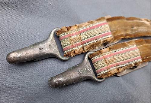 Unknown German ww2 dagger hangers