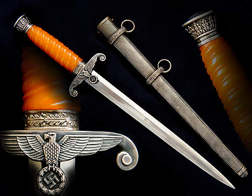 Glass handled daggers......